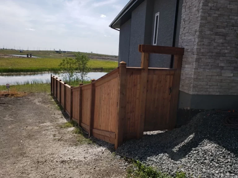Wooden fence installed on the incline