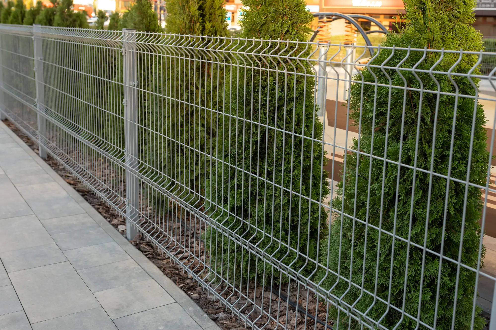 welded wire fence along walkway